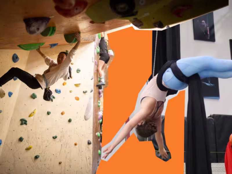 A climber on the ceiling mashed with a circus performer laying back in straps 